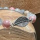 Bracelet Mala Rhodonite/ Quartz gris + plume